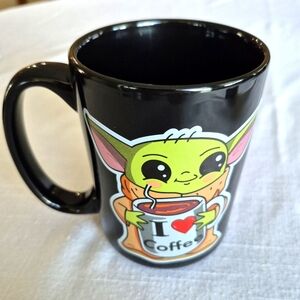 Baby Yoda coffee mug.